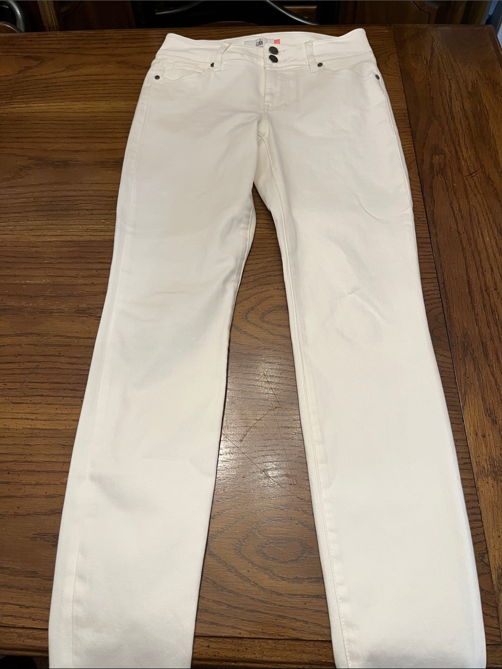 Cabi ivory cinch skinny jeans, size 4
